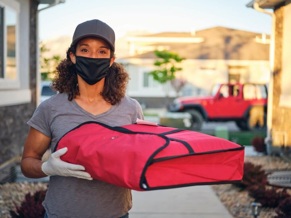 Should You Tip Pizza Delivery Drivers? Here's What the Experts Say